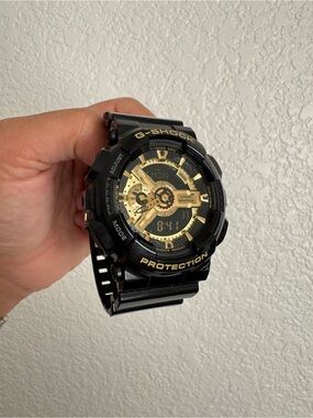 G-SHOCK GA110GB Black and Gold Analog-Digital Watch